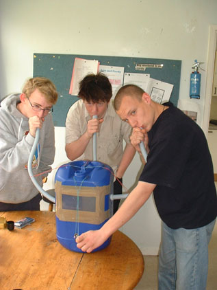 Pat, Jake and John with their student bong.